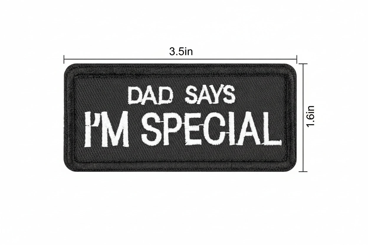 Black patch with 'Dad says I'm special' text and measurements on a white background
